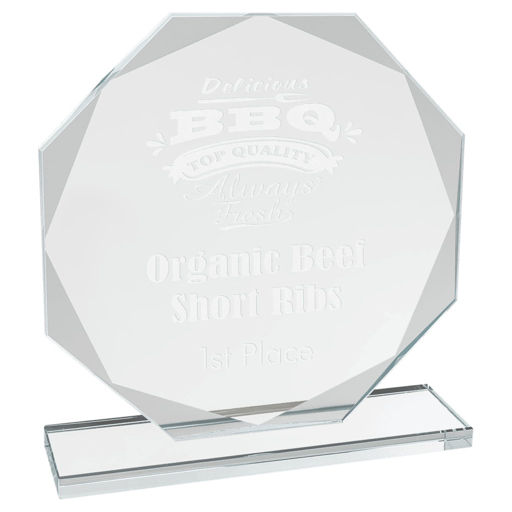 Glass trophy with the text 'Delicious BBQ Top Quality Always Fresh Organic Beef Short Ribs 1st Place' engraved on it.