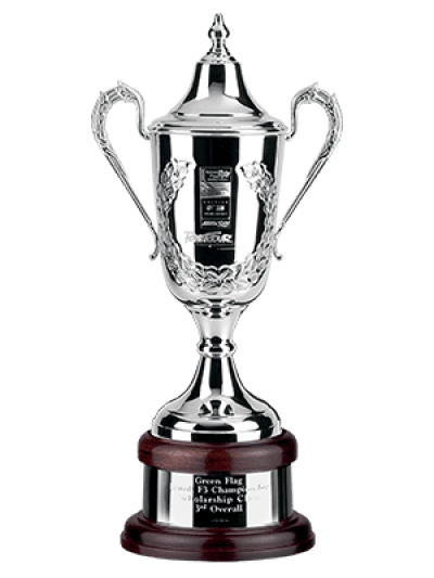 A silver sports trophy cup with two ornate handles, mounted on a wooden base with an engraved plaque.