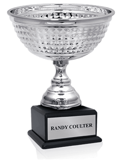 A silver sports trophy cup with a textured design, mounted on a black base with a nameplate that reads "Randy Coulter."