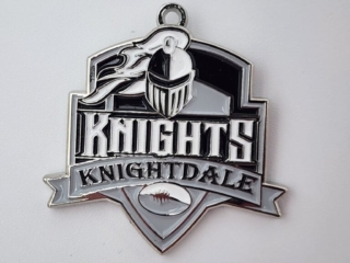 Custom medal featuring a stylized knight's helmet above the word 'KNIGHTS,' with 'KNIGHTDALE' written on a banner below and a football emblem at the bottom.