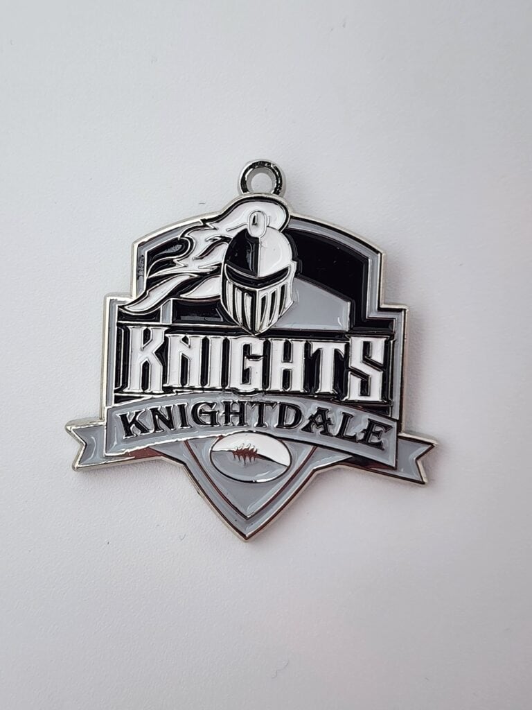 Custom medal featuring a stylized knight's helmet above the word 'KNIGHTS,' with 'KNIGHTDALE' written on a banner below and a football emblem at the bottom.